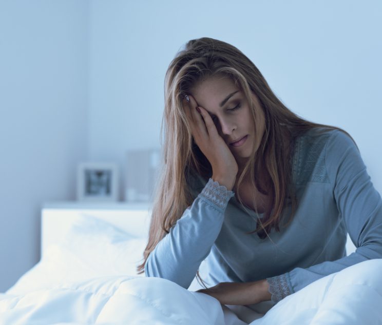 Depressed,Woman,Awake,In,The,Night,,She,Is,Touching,Her
